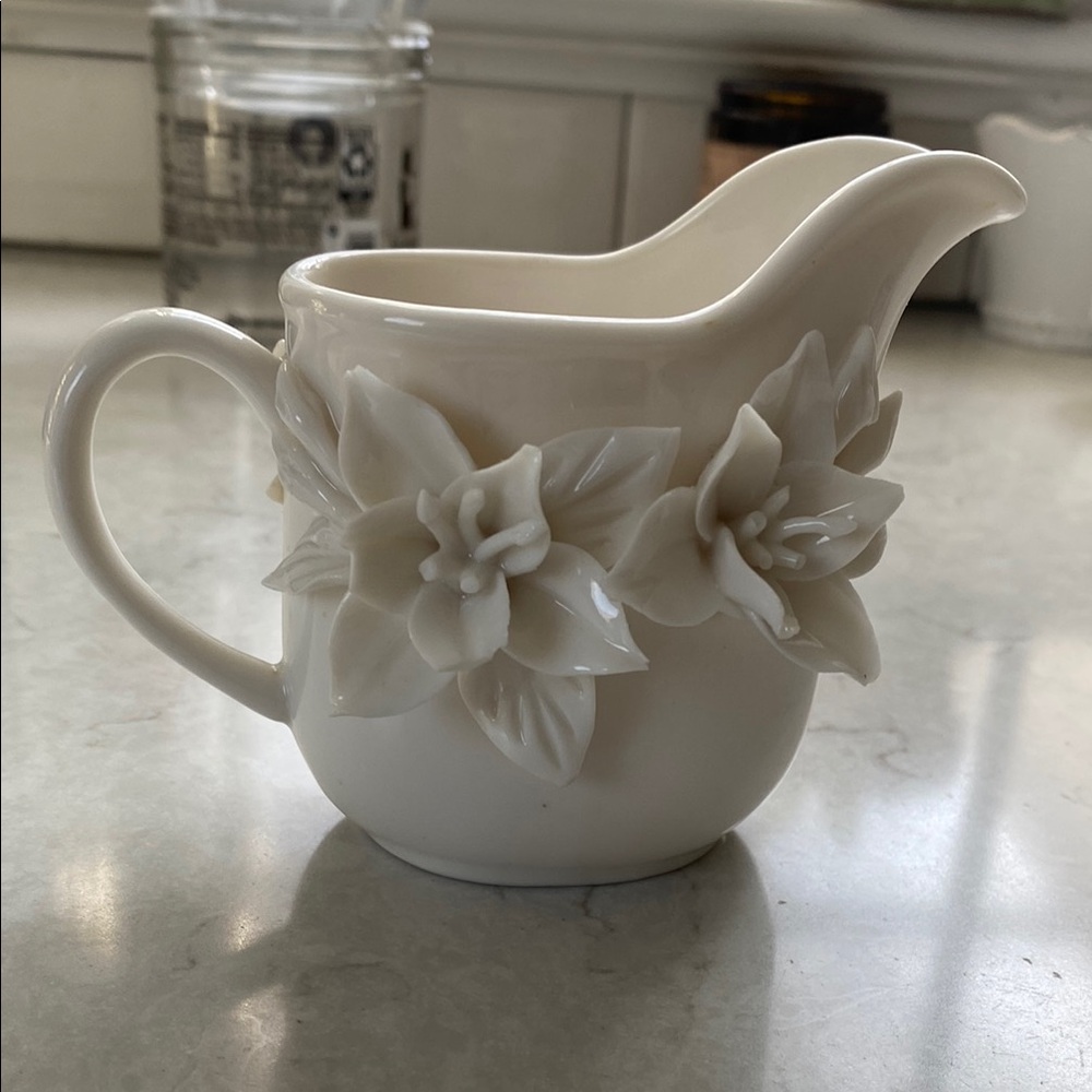 Cream Ceramic Pitcher with Floral Design